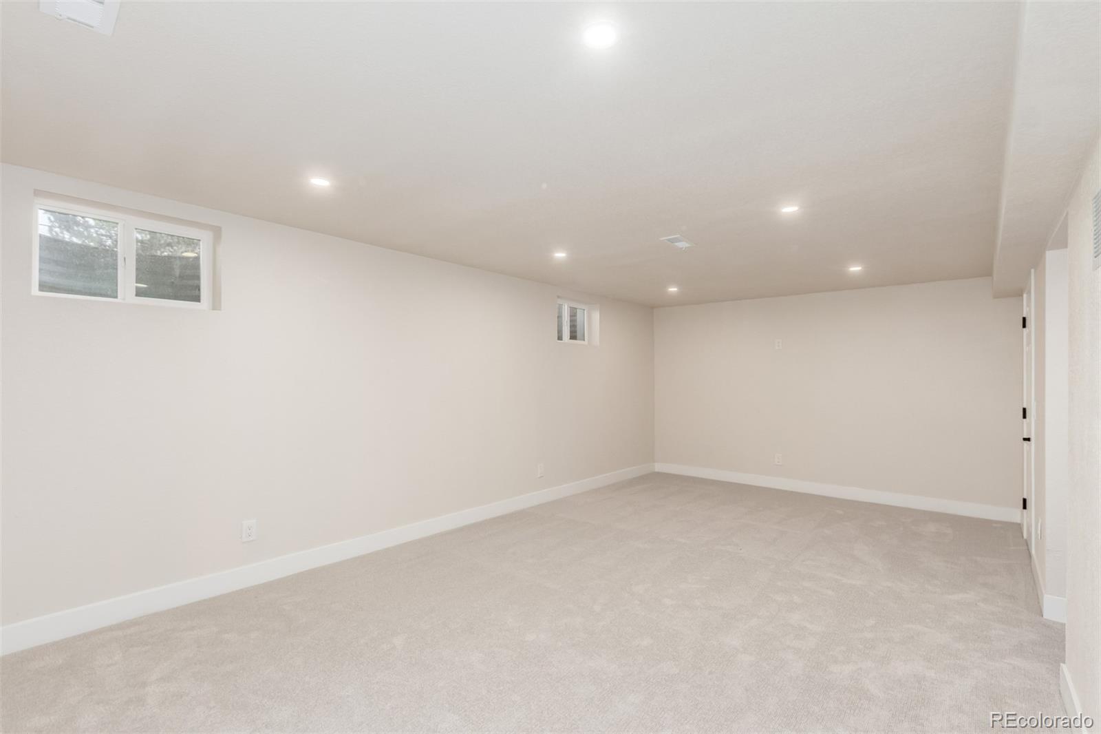 1760 South Dale Court Denver, CO 80219 - Photo 12 of 23 an empty room with a empty space