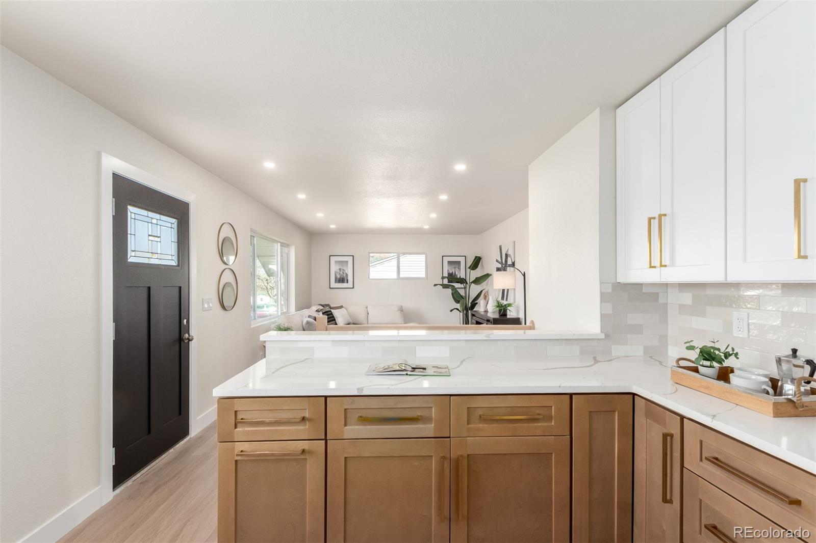 1760 South Dale Court Denver, CO 80219 - Photo 8 of 23 a view of kitchen with wooden floor