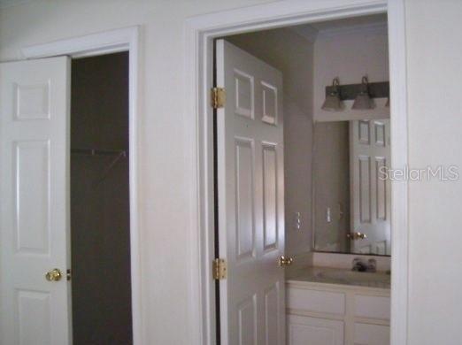 2905 Southwest Archer Road, Unit 4006 Gainesville, FL 32608 - Photo 5 of 8 a bathroom with a granite countertop shower