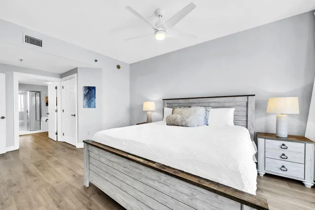 a bathroom with a granite countertop sink mirror and double