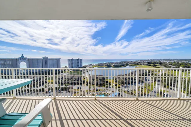 a view of balcony with furniture