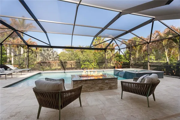 a balcony with furniture and outdoor view