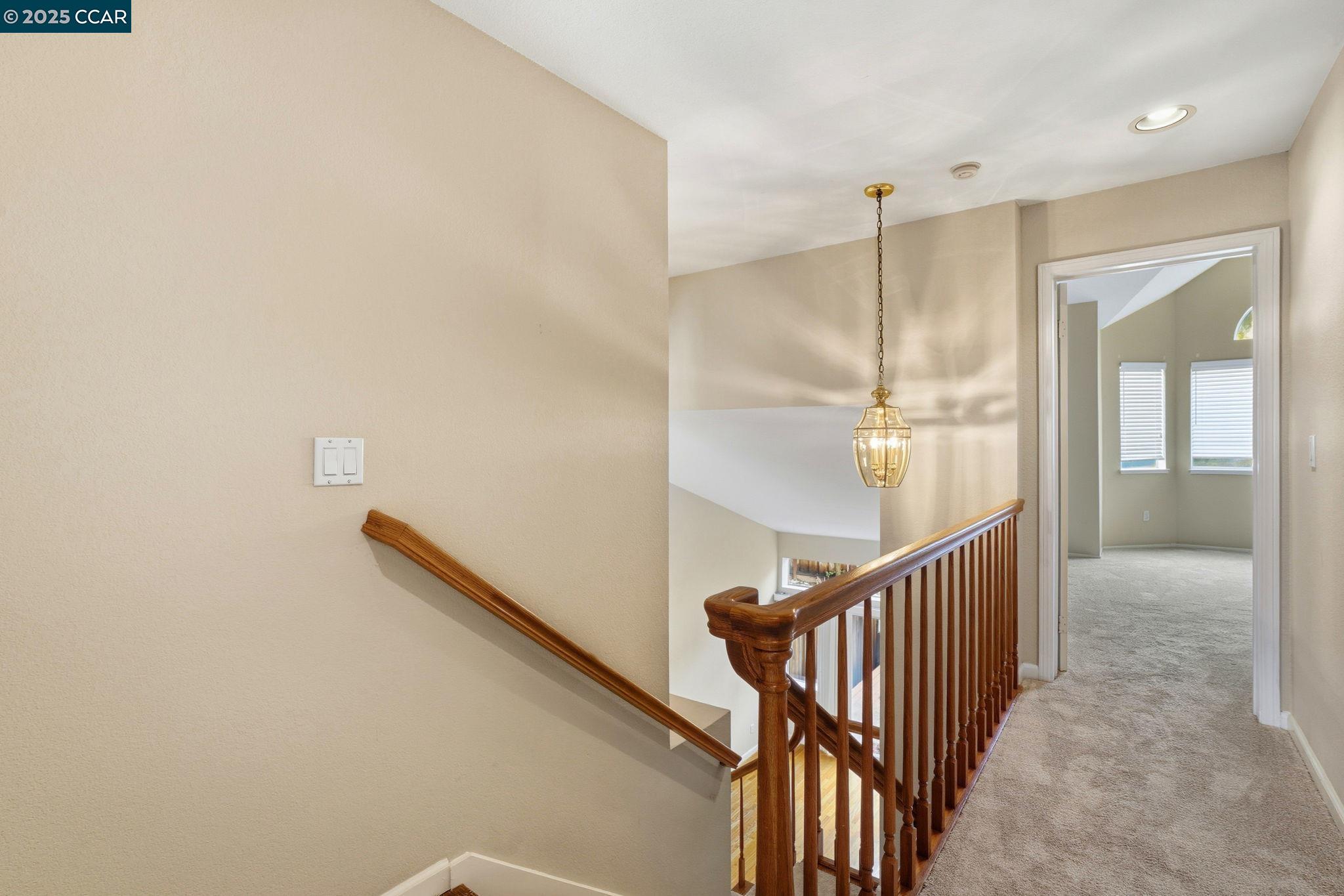 1295 Shell Circle Clayton, CA 94517 - Photo 19 of 36 a view of staircase with railing and white walls
