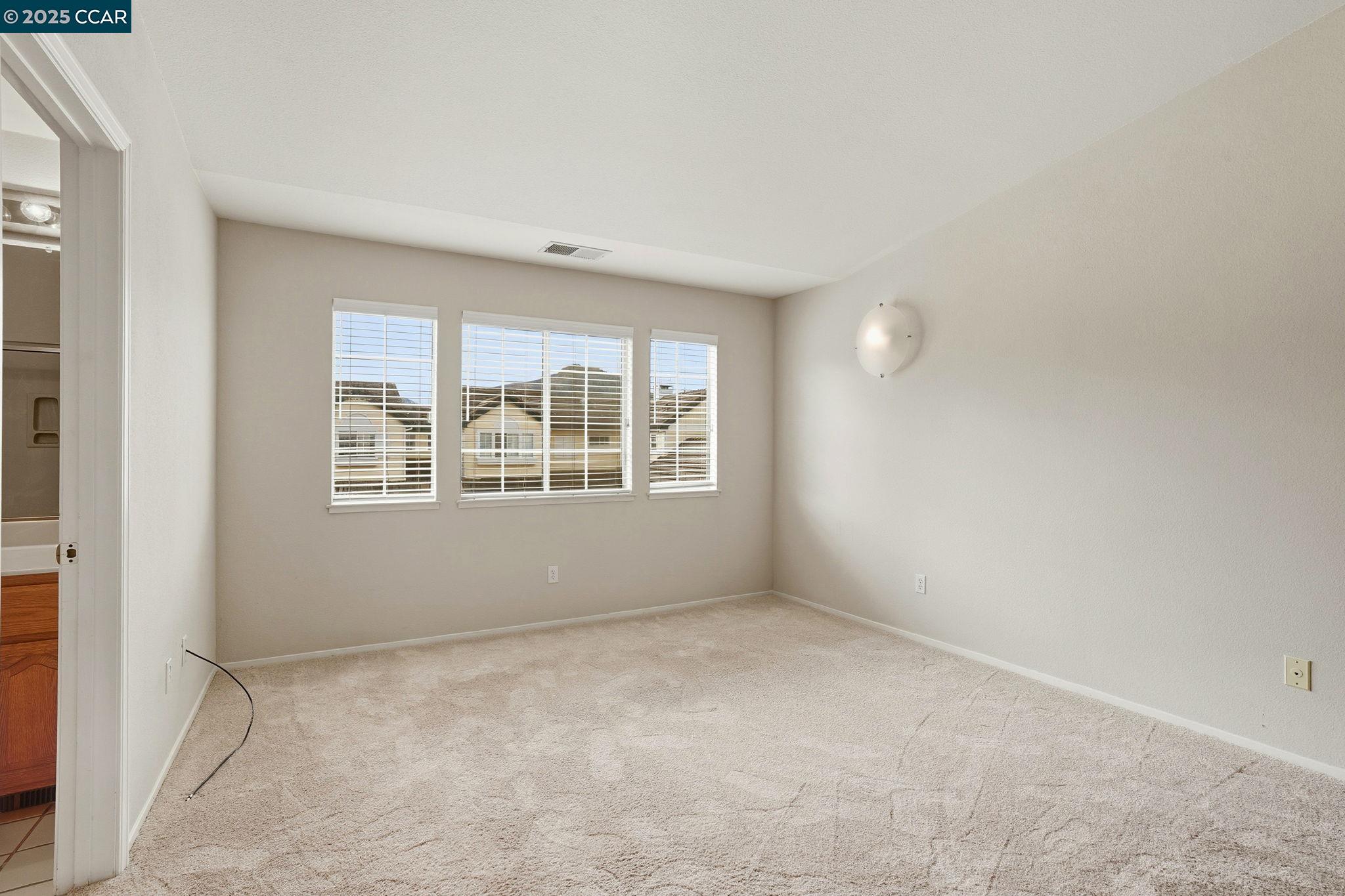 1295 Shell Circle Clayton, CA 94517 - Photo 25 of 36 a view of an empty room with a window