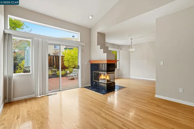 a view of living room with furniture and a flat screen tv