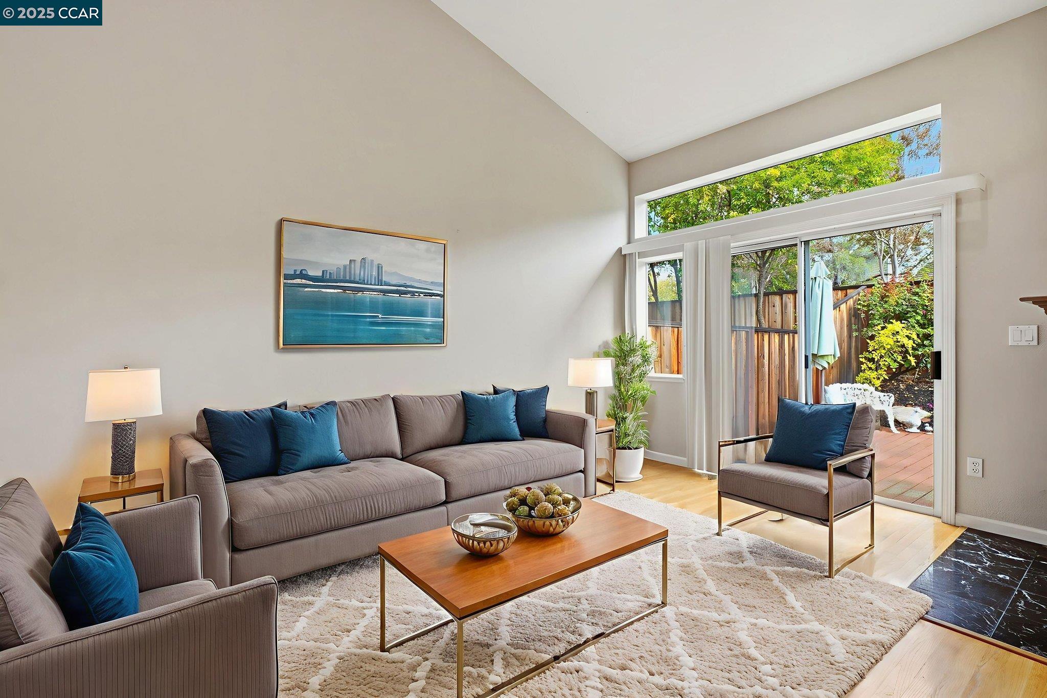1295 Shell Circle Clayton, CA 94517 - Photo 7 of 36 a living room with furniture and a potted plant