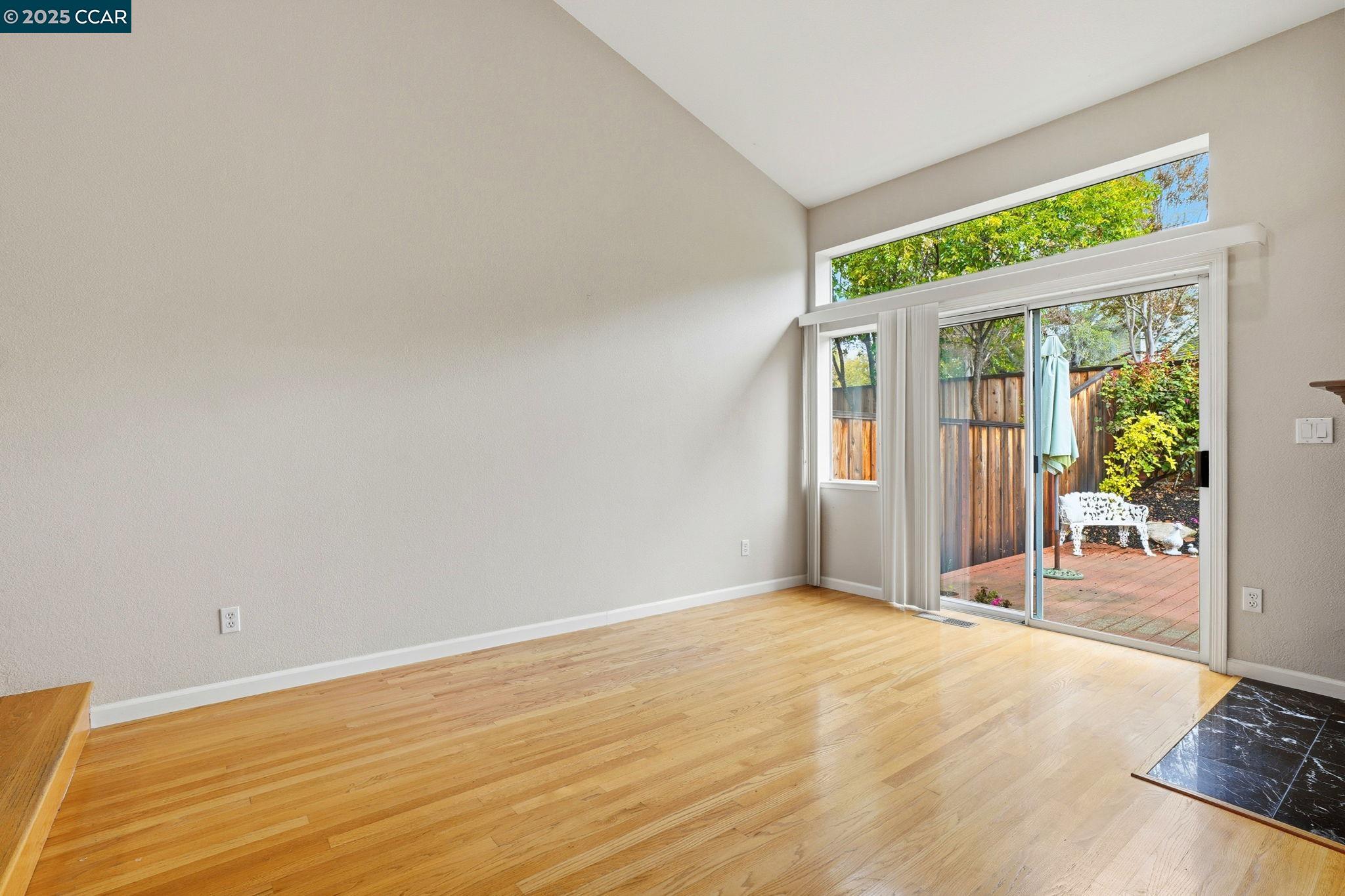 1295 Shell Circle Clayton, CA 94517 - Photo 8 of 36 a view of an empty room with a window
