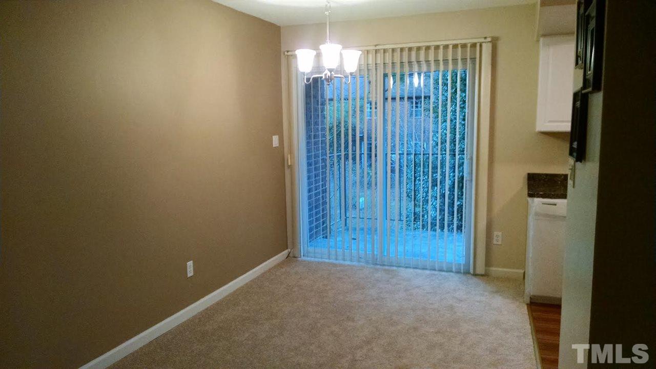 5808 Falls Of Neuse Road, Unit D Raleigh, NC 27609 - Photo 2 of 6 a view of entryway with wooden floor