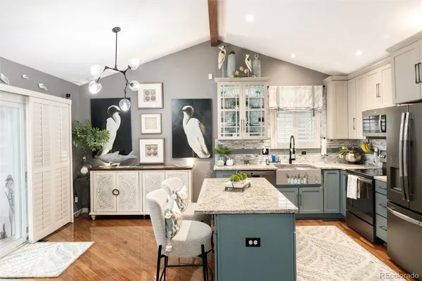 a view of a swimming pool with lounge chairs