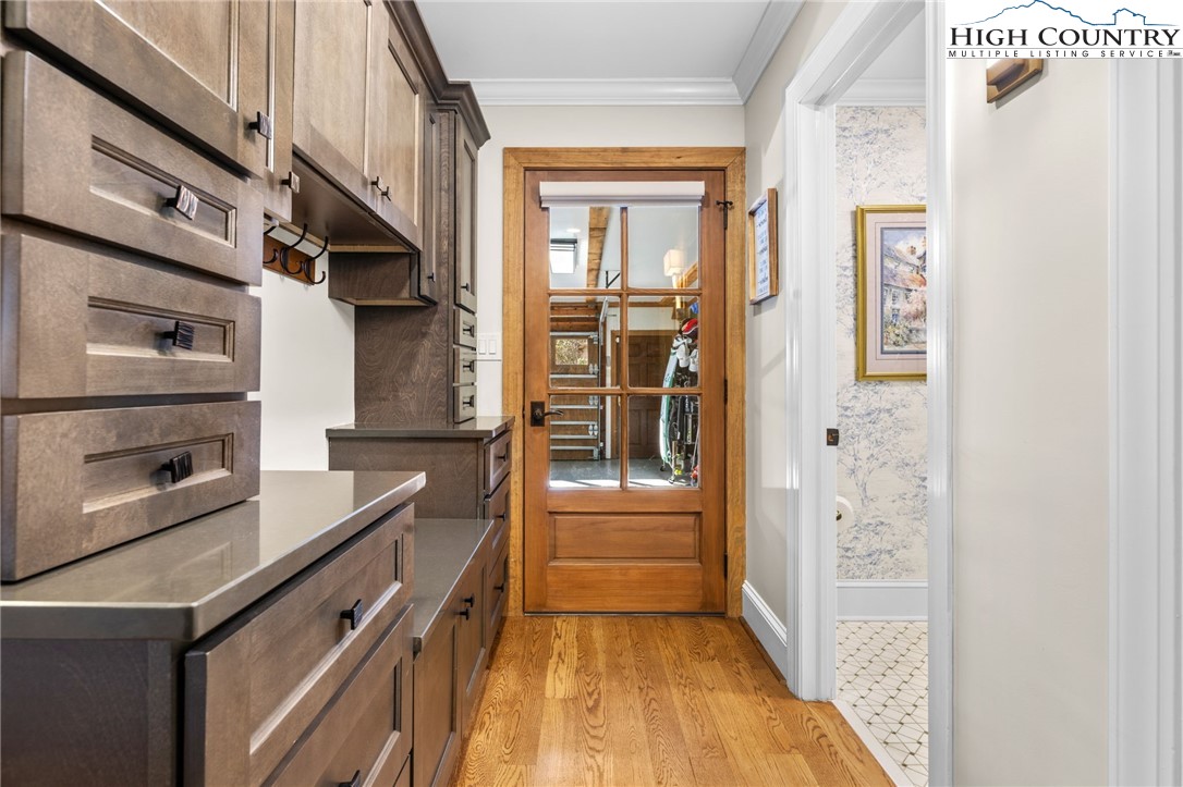 129 Valley View Road Blowing Rock, NC 28605 - Photo 13 of 45 a kitchen with granite countertop a refrigerator and a stove