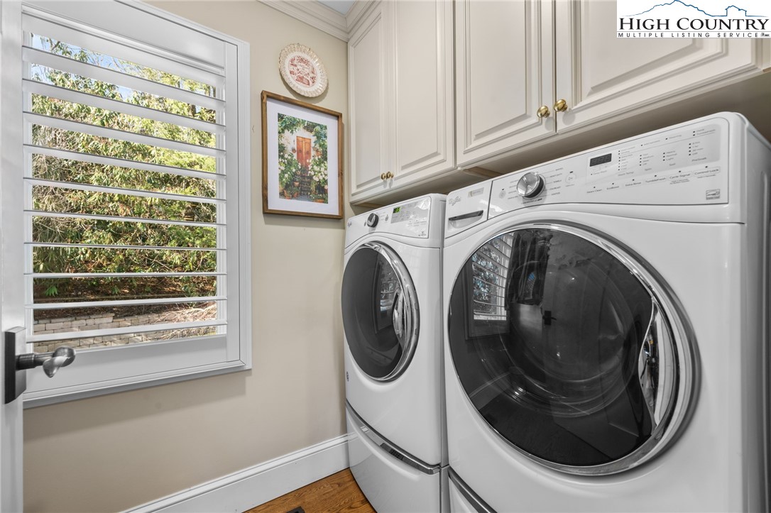 129 Valley View Road Blowing Rock, NC 28605 - Photo 14 of 45 a utility room with dryer and washer