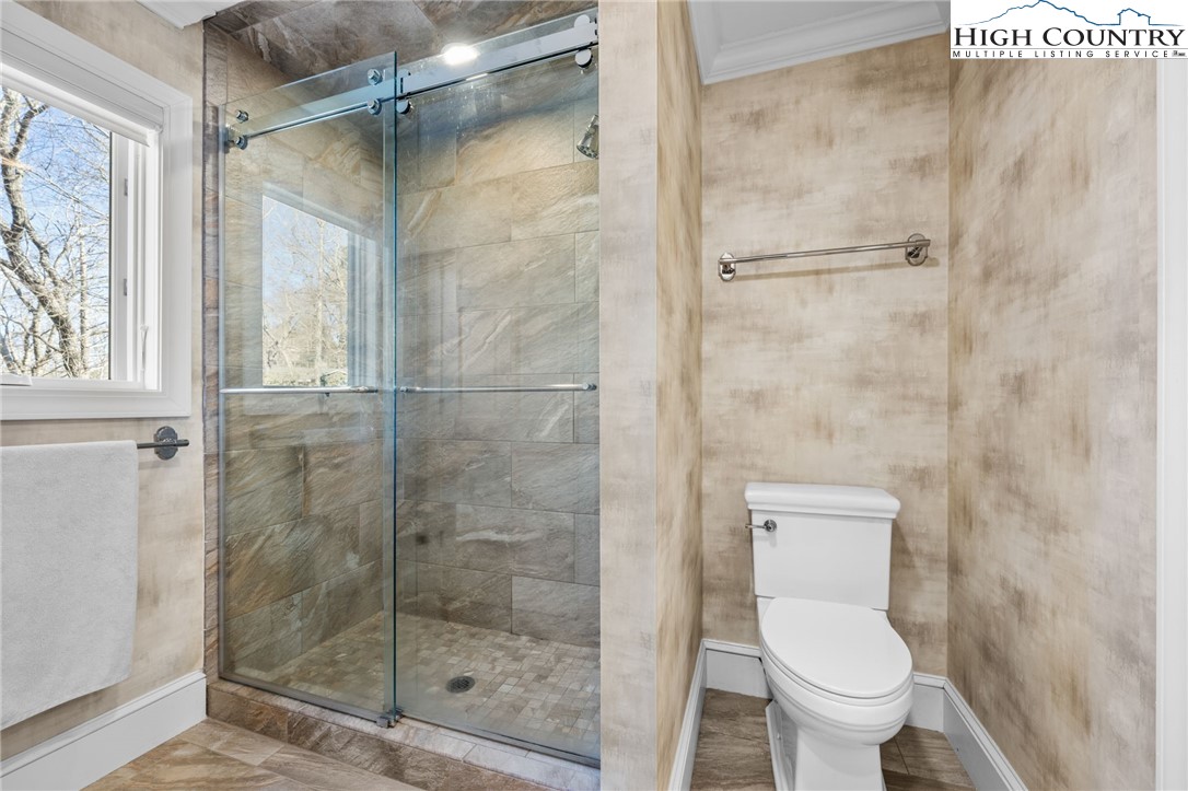 129 Valley View Road Blowing Rock, NC 28605 - Photo 20 of 45 a bathroom with a toilet and a shower