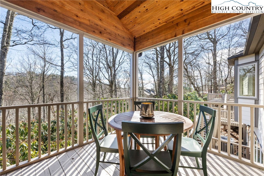 129 Valley View Road Blowing Rock, NC 28605 - Photo 23 of 45 a view of a patio with a table and chairs