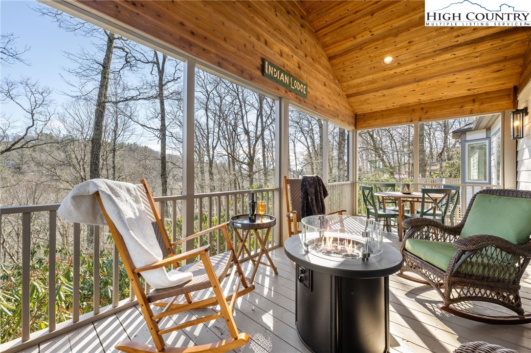 129 Valley View Road Blowing Rock, NC 28605 - Photo 24 of 45 a view of a dining room with furniture window and outside view