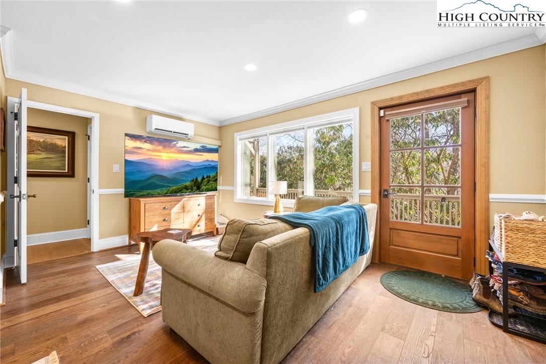 129 Valley View Road Blowing Rock, NC 28605 - Photo 32 of 45 a living room with furniture and a flat screen tv