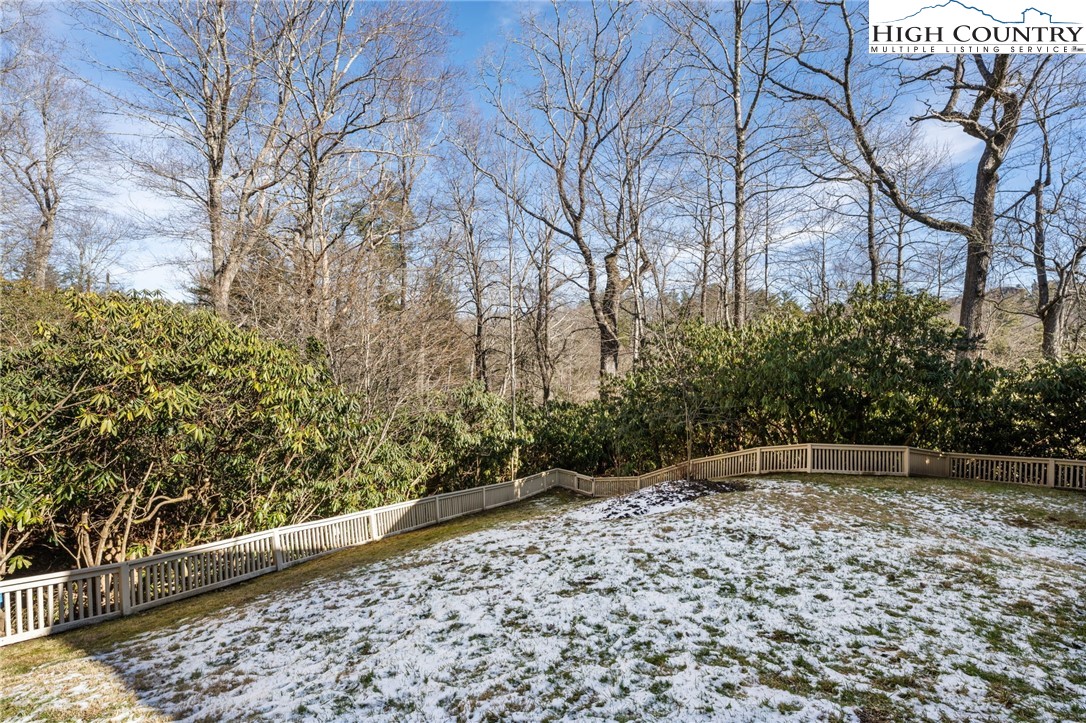 129 Valley View Road Blowing Rock, NC 28605 - Photo 36 of 45 a backyard of a house with lots of green space