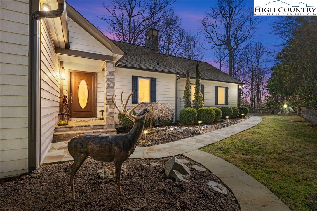 129 Valley View Road Blowing Rock, NC 28605 - Photo 37 of 45 a view of a house with backyard porch and sitting area