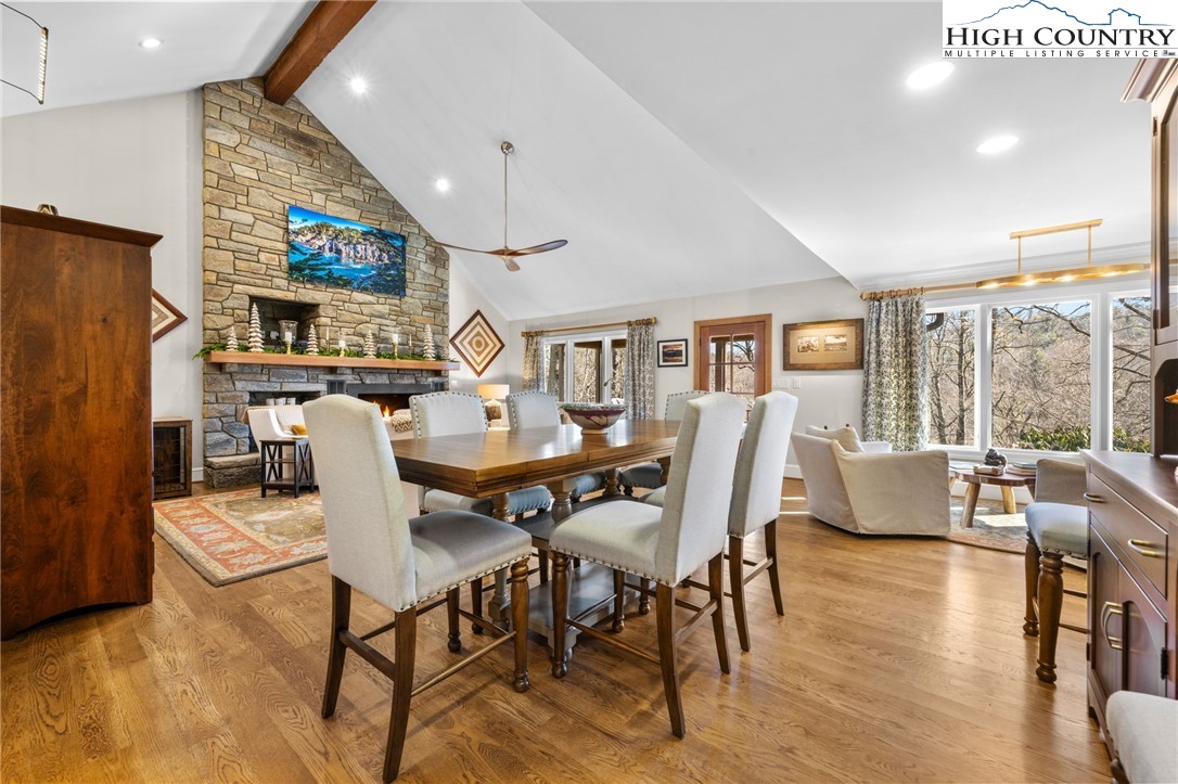 129 Valley View Road Blowing Rock, NC 28605 - Photo 4 of 45 a view of a dining room with furniture window and wooden floor
