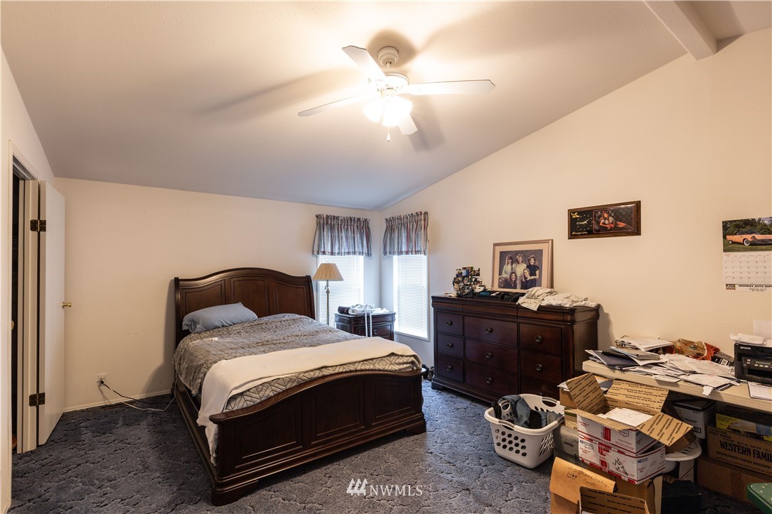 35909 Old Sultan-Startup Road Sultan, WA 98294 - Photo 11 of 22 a bedroom with a bed and furniture