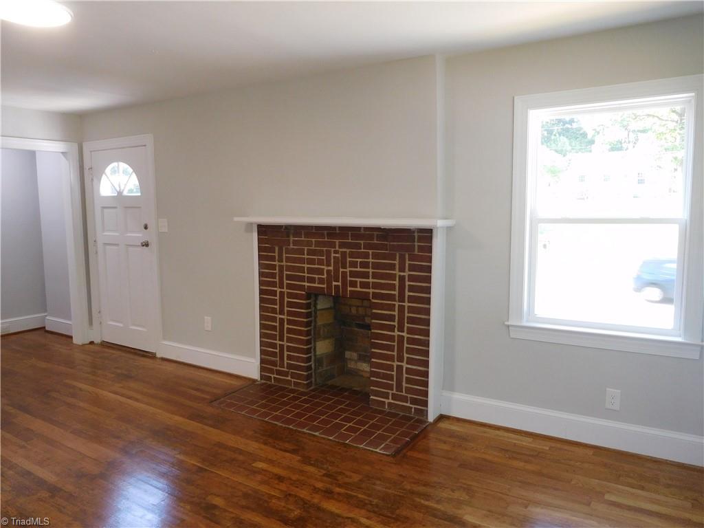 1025 Motor Road Winston-Salem, NC 27105 - Photo 3 of 33 SPACIOUS LIVING ROOM. BEAUTIFUL HARDWOODS THROUGHOUT MAIN LEVEL.