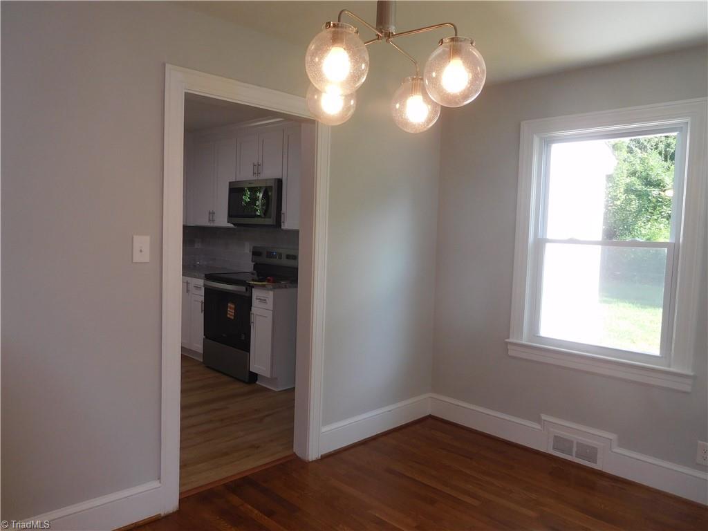 1025 Motor Road Winston-Salem, NC 27105 - Photo 10 of 33 LOOKING INTO THE KITCHEN FROM DR.