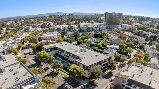 an aerial view of a city with lots of residential buildings
