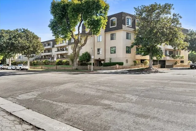 a view of a building with a street