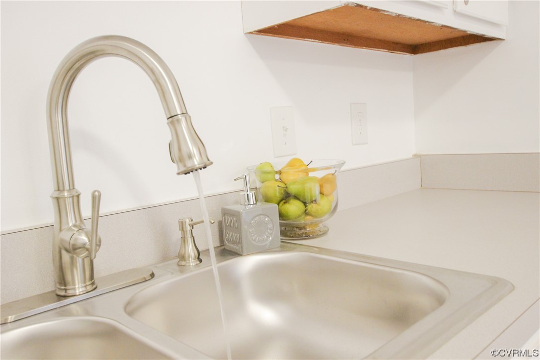 1120 Mill Road King William, VA 23086 - Photo 12 of 40 a bathroom with a sink and a window