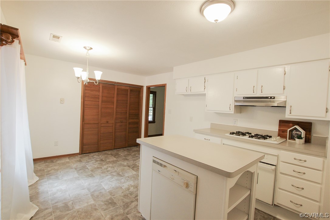 1120 Mill Road King William, VA 23086 - Photo 13 of 40 a kitchen with white cabinets and appliances