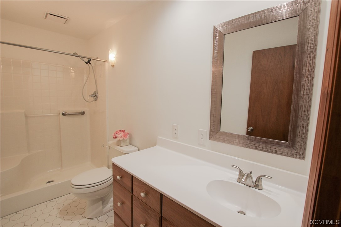 1120 Mill Road King William, VA 23086 - Photo 18 of 40 a bathroom with a sink toilet and shower