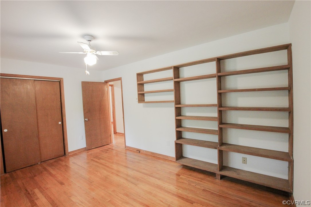1120 Mill Road King William, VA 23086 - Photo 21 of 40 a view of an empty room with a window and wooden floor