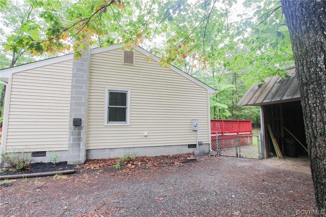 1120 Mill Road King William, VA 23086 - Photo 34 of 40 a view of a house with a yard and garage