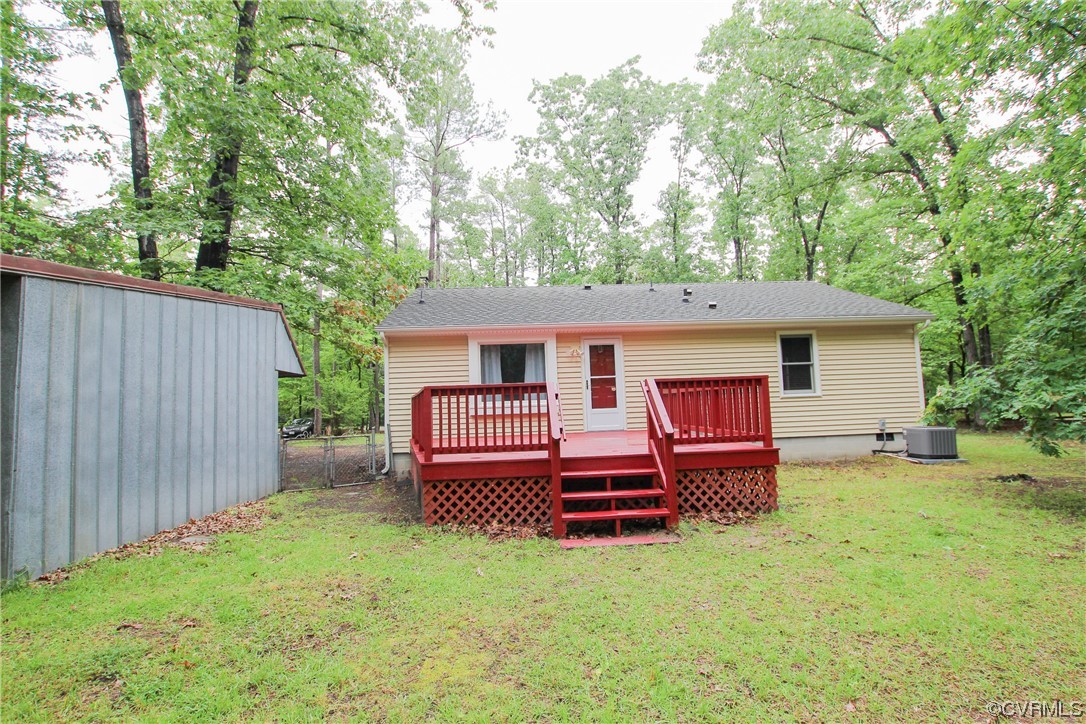 1120 Mill Road King William, VA 23086 - Photo 38 of 40 a view of a house with backyard and wooden fence