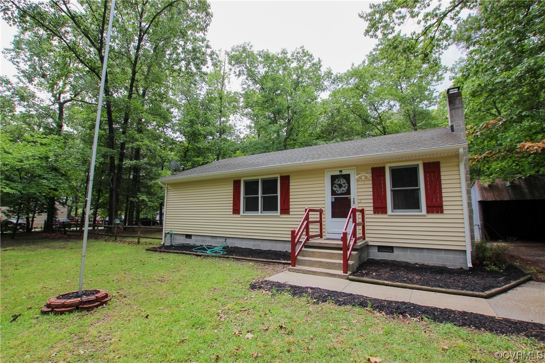 1120 Mill Road King William, VA 23086 - Photo 40 of 40 a backyard of a house with seating space