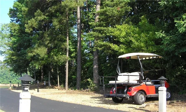 a wooden bench sitting in front of a building