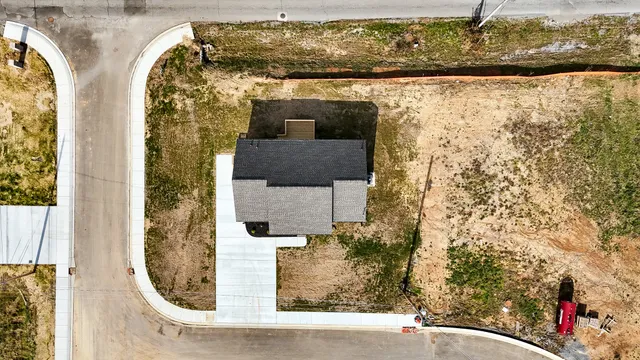 a view of a swimming pool with lounge chair