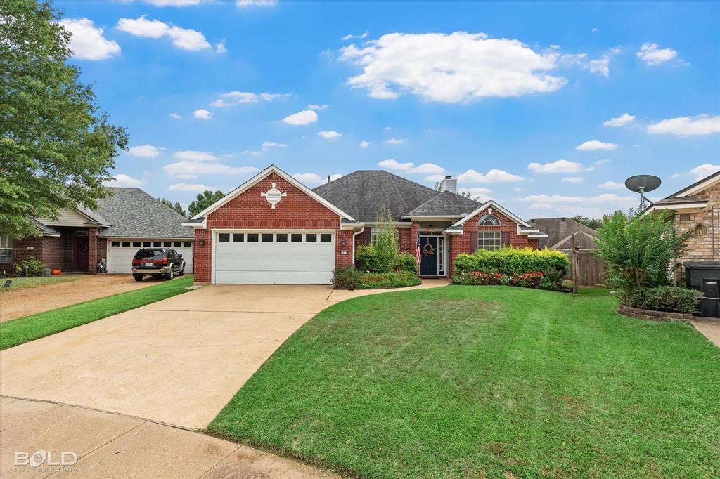 6020 Applegate Circle Bossier City, LA 71111 - Photo 1 of 36 a view of a house with a big yard plants and large trees