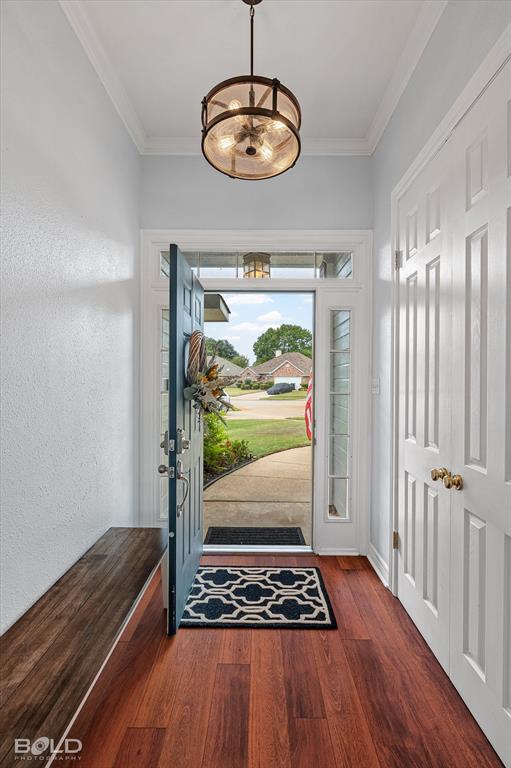 6020 Applegate Circle Bossier City, LA 71111 - Photo 12 of 36 a view of wooden floor and chandelier in a room
