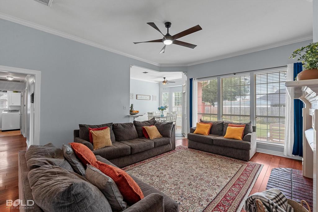 6020 Applegate Circle Bossier City, LA 71111 - Photo 16 of 36 a living room with furniture and a rug