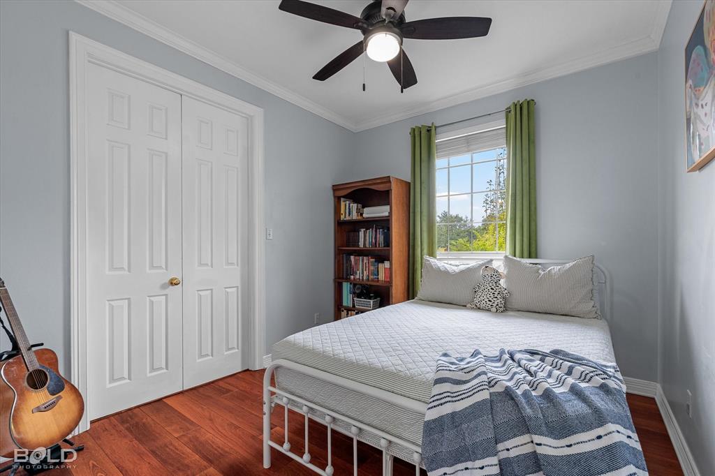 6020 Applegate Circle Bossier City, LA 71111 - Photo 32 of 36 a bedroom with a bed and a window