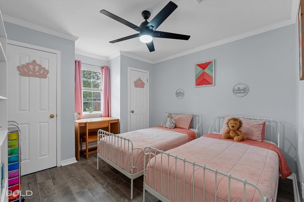 6020 Applegate Circle Bossier City, LA 71111 - Photo 35 of 36 a bedroom with a bed and a window