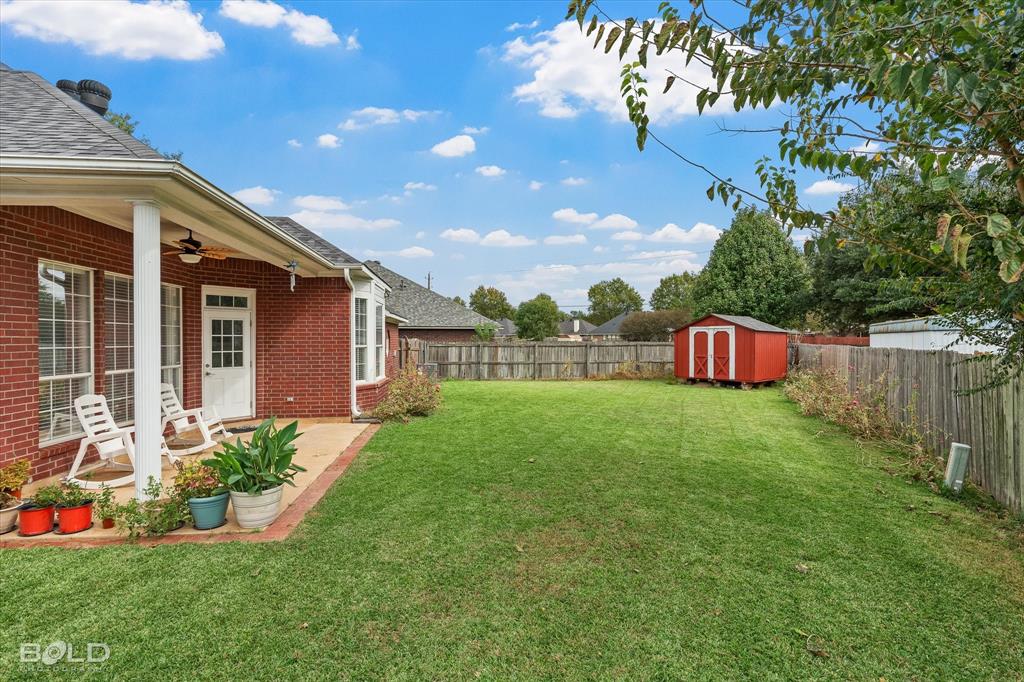 6020 Applegate Circle Bossier City, LA 71111 - Photo 9 of 36 a view of a house with backyard and sitting area