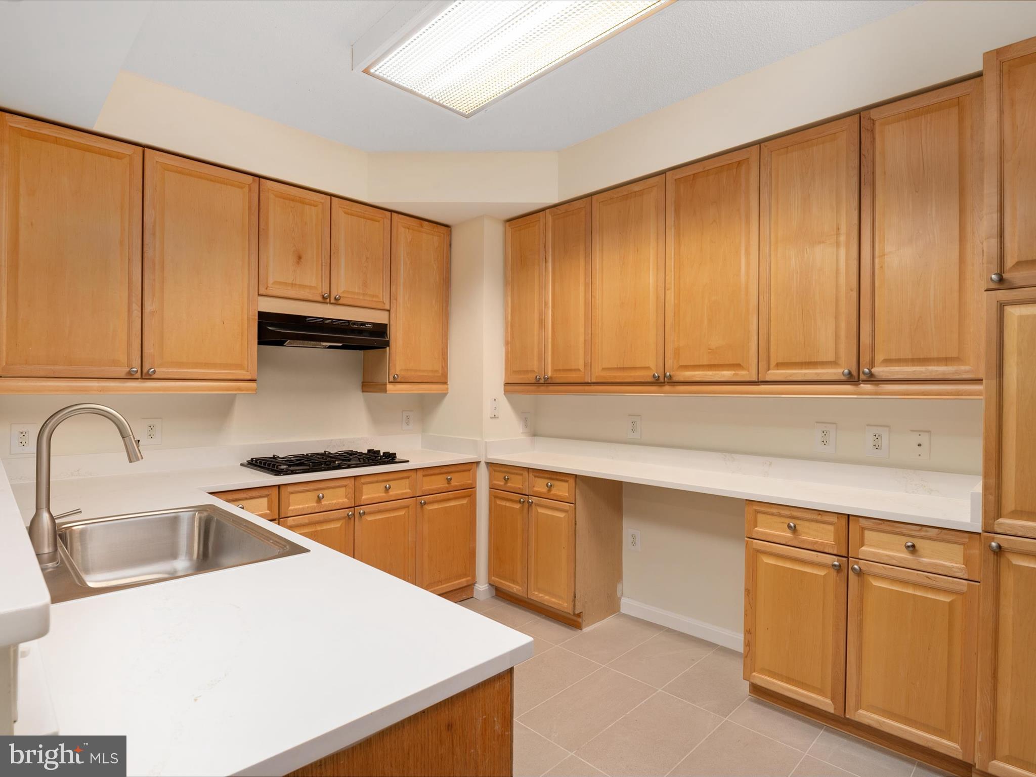 940 Astern Way, Unit 604 Annapolis, MD 21401 - Photo 12 of 27 a kitchen with stainless steel appliances granite countertop a sink a stove and cabinets