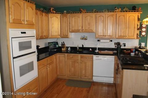 255 Wheeler Road Clarkson, KY 42726 - Photo 20 of 54 Maple Cabinets with Granite Countertops and Whirlpool Appliances that remain and Gas Jenn Air Downdraft.