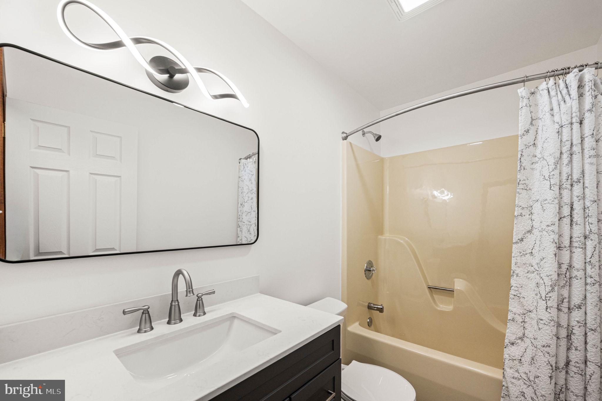 451 Township Line Road Bechtelsville, PA 19505 - Photo 21 of 33 Hall Bathroom