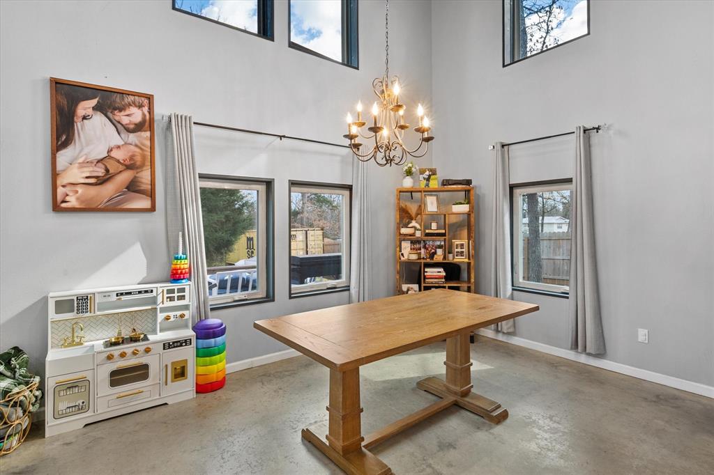 230 Fcr, Unit 540 Fairfield, TX 75840 - Photo 19 of 37 a room with toys and a chandelier