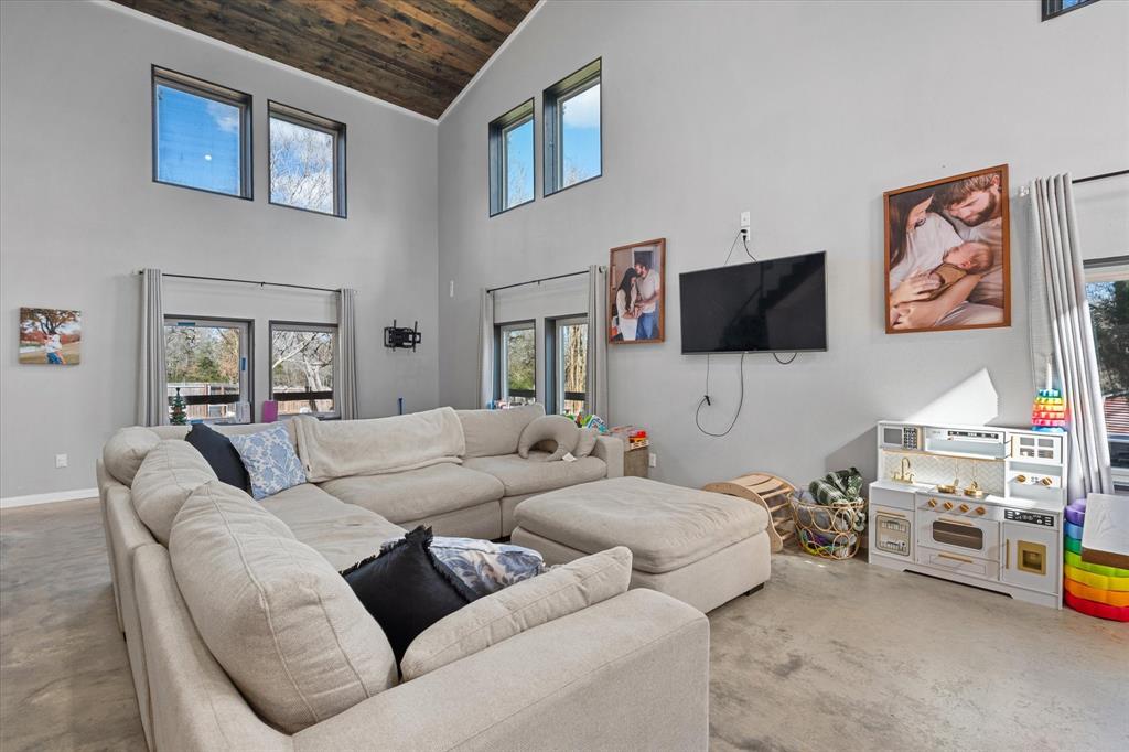 230 Fcr, Unit 540 Fairfield, TX 75840 - Photo 6 of 37 a living room with furniture and a flat screen tv