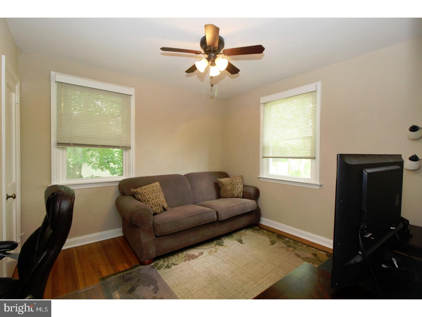 415 Hawarden Road Springfield, PA 19064 - Photo 14 of 25 a living room with furniture and a window