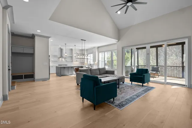 a living room with furniture and a table