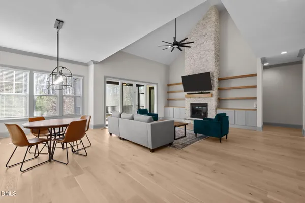 a view of a dining room with furniture window and wooden floor